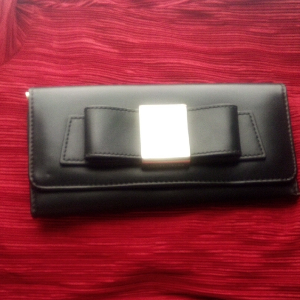 Elegant Black Clutch with Bow Accent (Ivanka Trump)